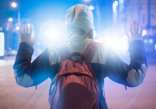 A teen getting caught by police, needing the assistance of experts of Juvenile Law in Peoria IL