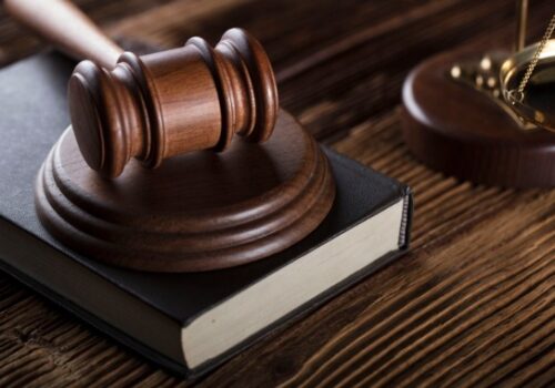 A gavel on a law book for a criminal defense lawyer in Pekin IL
