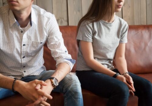 An unhappy couple getting ready to talk with an East Peoria IL Divorce Attorney