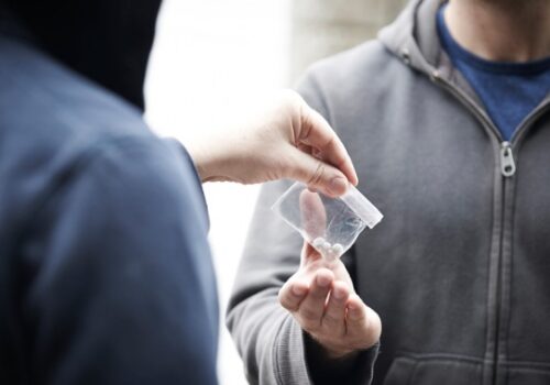 Man buying drugs, Drug Lawyer East Peoria IL
