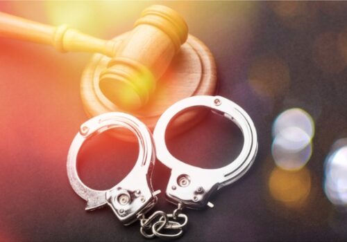 Sexual Solicitation with handcuffs and gavel in Pekin IL
