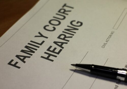 Family court hearing paperwork represents the need to hire a Juvenile Lawyer in Pekin IL