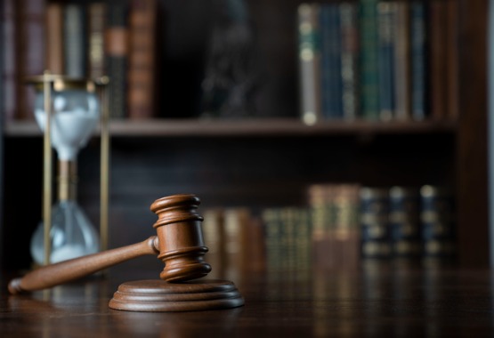 A gavel on a desk represents your need for representation when facing a Misdemeanor in Peoria IL