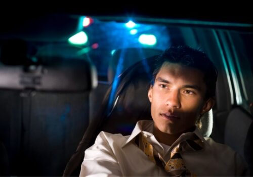 A man being pulled over for drunk driving, needing a DUI attorney in Peoria IL