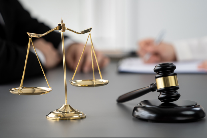 An attorney meeting with another attorney to discuss a family law case